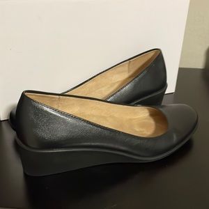 Worn once, black close toed wedges.